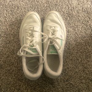 White and green Reeboks